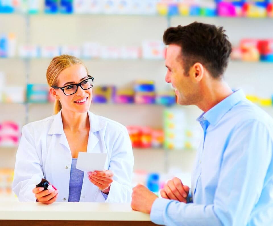 pharmacist holding a paper